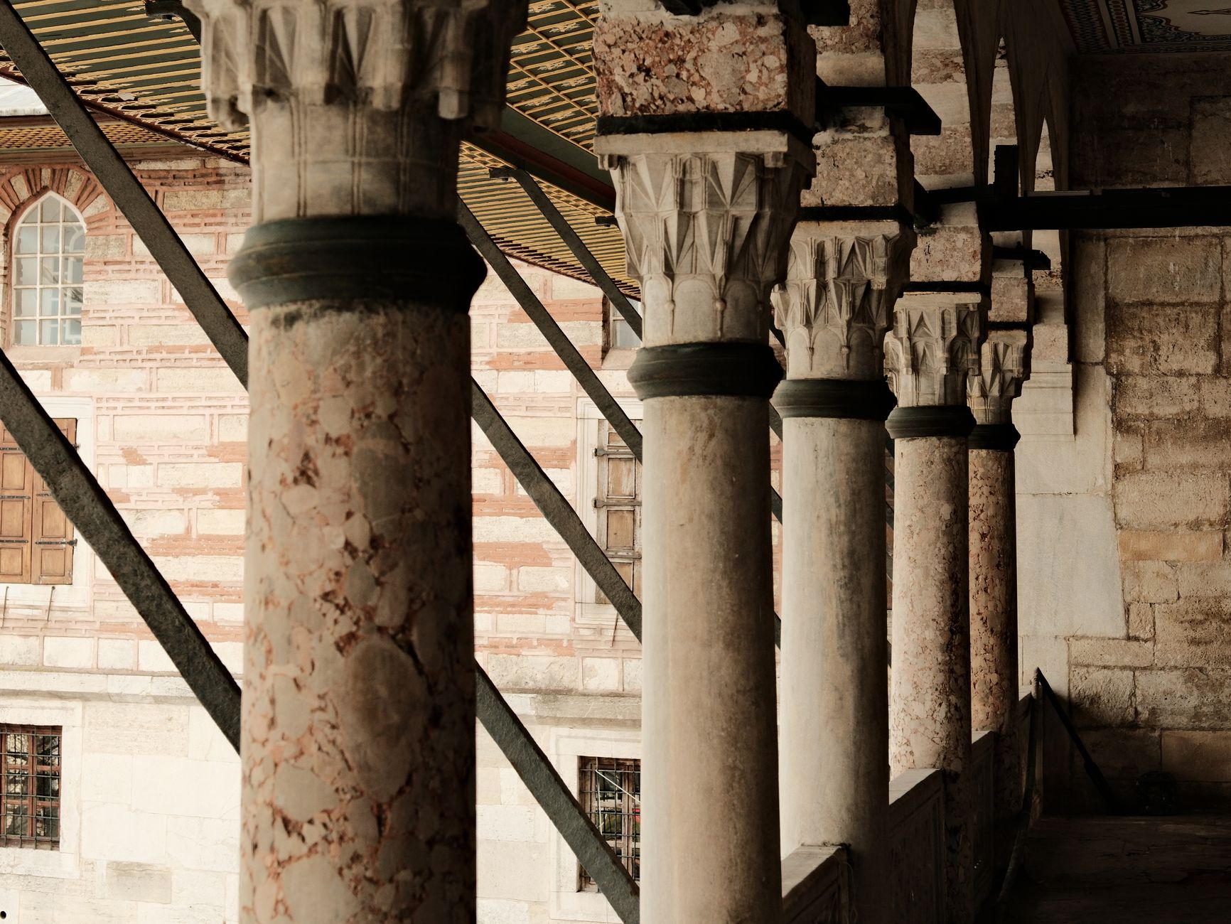 Vintage columns in İstanbul showcasing historic architecture.