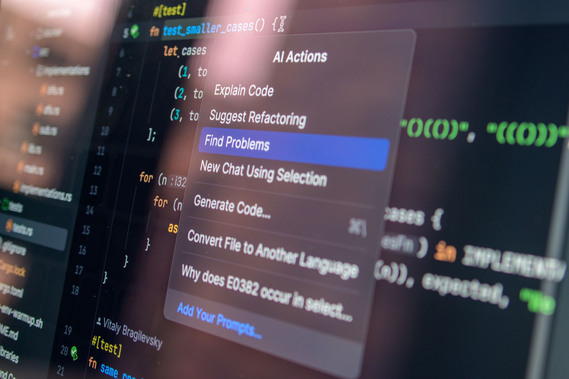 Close-up of AI-assisted coding with menu options for debugging and problem-solving.