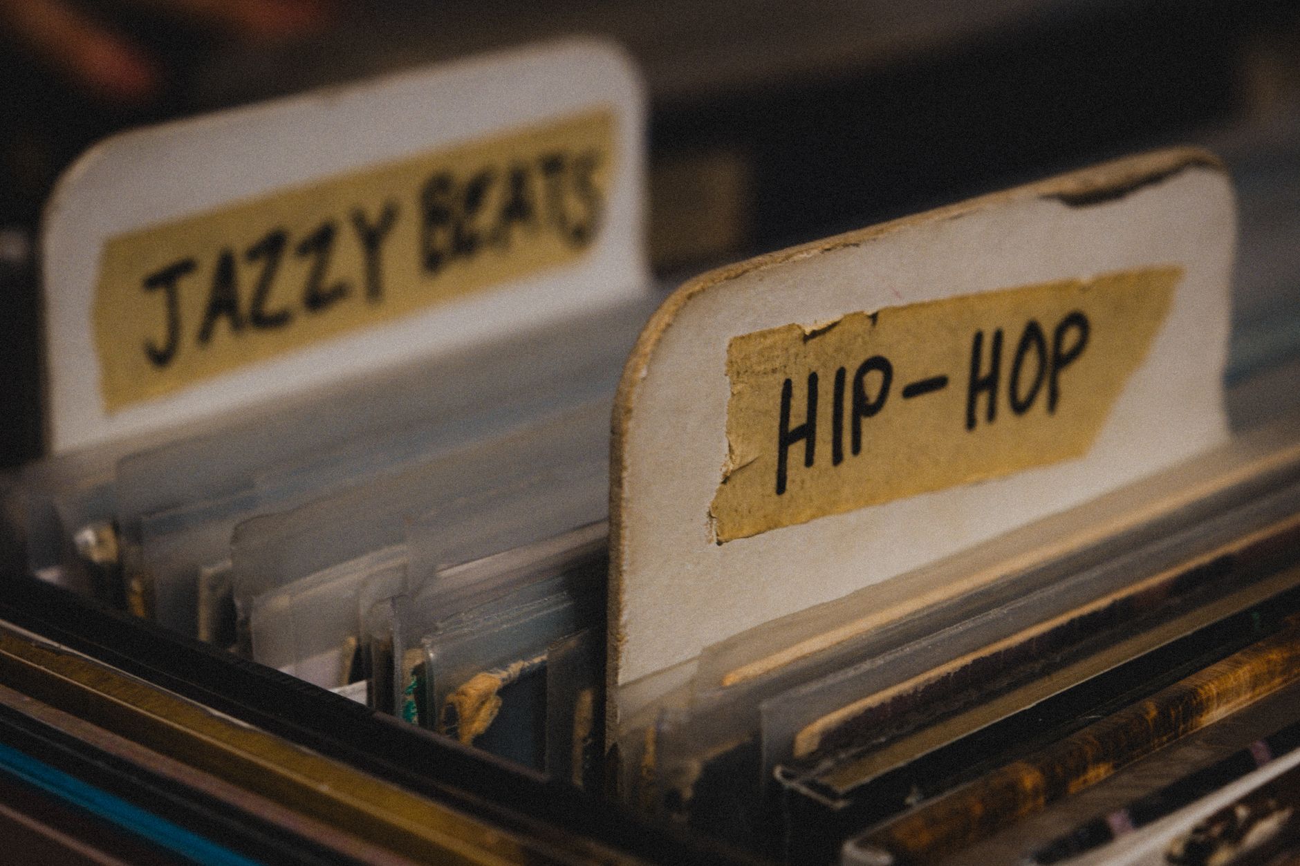 Vinyl records categorized under 'Jazzy Beats' and 'Hip-Hop' in a vintage collection.